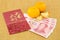 Chinese new year with money yuan banknote and ingot
