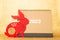 Chinese New Year Rabbit mascot with 2023 calendar on golden background translation of the Chinese is fortune no logo no