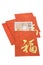 Chinese New Year red packets and British currency