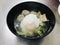 Chinese noodles soup with minced pork and poached egg.