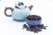 Chinese Oolong Dark Red tea WuYi Rou gui in a blue ceramic bowl