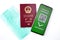 Chinese passport, mask and covid application in mobile phone