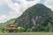 Chinese pavilion located near the mountains