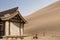 Chinese pavilion near the sand dunes in the desert