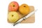 Chinese Pear,Apple,Knife on chopping board Isolated