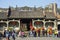 Chinese people playing lion dance in a Ancestral hall