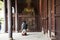 Chinese people praying Chinese angel warrior door keeper statue at gate of Tiantan temple at Shantou town or Swatow city