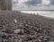 Chinese plastic bottle blown onto the rocky beach at Birling Gap, Sussex