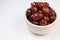Chinese red date or Jujube asian herbal fruit for healthy on white background under sunlight.