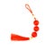 Chinese red knot with tassel, top view photo. Asian holiday symbol. Red silk knot isolated. Chinese New Year decoration