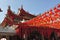 chinese red lanterns display at temple festival during daytime