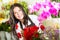 Chinese Saleswoman in a flower shop