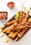 Chinese satay skewers with grilled diced meat