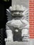 Chinese stone lion or dragon guarding rural temple