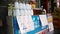 Chinese street store. On the window are bottles of cold tea, plum soup