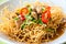 Chinese style deep fried yellow noodles with pork