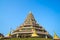 Chinese style pagoda in Thai temple under blue sky