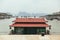 Chinese style shrine on the land with Ha Long Bay limestone islands in the background in summer at Quang Ninh, Vietnam