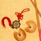 Chinese talisman and fortune cookies on golden surface, Chinese New Year concept