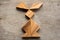 Chinese tangram puzzle in rabbit shape on wood background Con