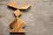 Chinese tangram puzzle in rabbit shape on wooden background Con