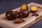 Chinese tea eggs, cut or whole marinated eggs in dark background