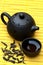 Chinese tea set and wild puerh on yellow mat