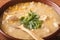 Chinese thick corn soup with chicken close up. horizontal