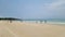 Chinese tourist on the beach of Koh Samet Thailand taking photos and selfies