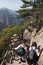 Chinese tourists walking on Yellow Mountain Huangshan China