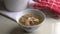 Chinese traditional American ginseng herbal with chicken bones soup in a bowl.