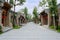 Chinese traditional buildings along slopy street on cloudy day