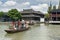 Chinese traditional rowboat in the Dianpu River in Zhujiajiao Ancient Water Town, a historic village in Shanghai, China