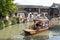 Chinese traditional rowboat sightseeing tour in Zhujiajiao Ancient Water Town, famous tourist destination in Shanghai, China