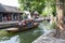 Chinese traditional rowboat sightseeing tour in Zhujiajiao Ancient Water Town, famous tourist destination in Shanghai, China