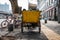 Chinese Trash Collection Wagon Parked on the Sidewalk During Workday in Xian, March 2018