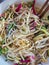 Chinese veggie salad with cucumber tofu and glass noodles close up