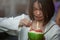 Chinese woman eating watermelon