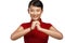 Chinese woman greeting gesture in elegant red dress