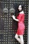 A Chinese woman in red dress in Feng Jing ancient town