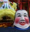 Chinese woman smiling mask and Chinese lion mask