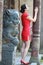 Chinese woman in traditional red cheongsam