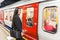 Chinese woman waiting at tube station