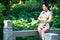 A Chinese woman wears traditional dress in the water park of Shanghai