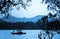 Chinese wooden recreation boat floats on the still water