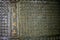 Chinese writing on a Giant brass bell in a Buddhist temple