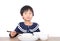 Chinese yellow-skinned little girl eating staple food dumplings
