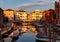 Chioggia - Scenic view of peaceful canal Vena nestled in charming town of Chioggia at sunrise, Venetian, Veneto