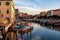 Chioggia - Scenic view of peaceful canal Vena nestled in charming town of Chioggia at sunrise, Venetian, Veneto