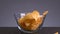 Chips falling on isolated background. Stock footage. Delicious chips fall and cause appetite. Harmful snacks in form of